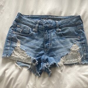 American Eagle Outfitters Light Blue Distressed Denim Shorts with Lace Insets